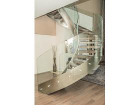 Металлические винтовые лестницы со стеклянными перилами
