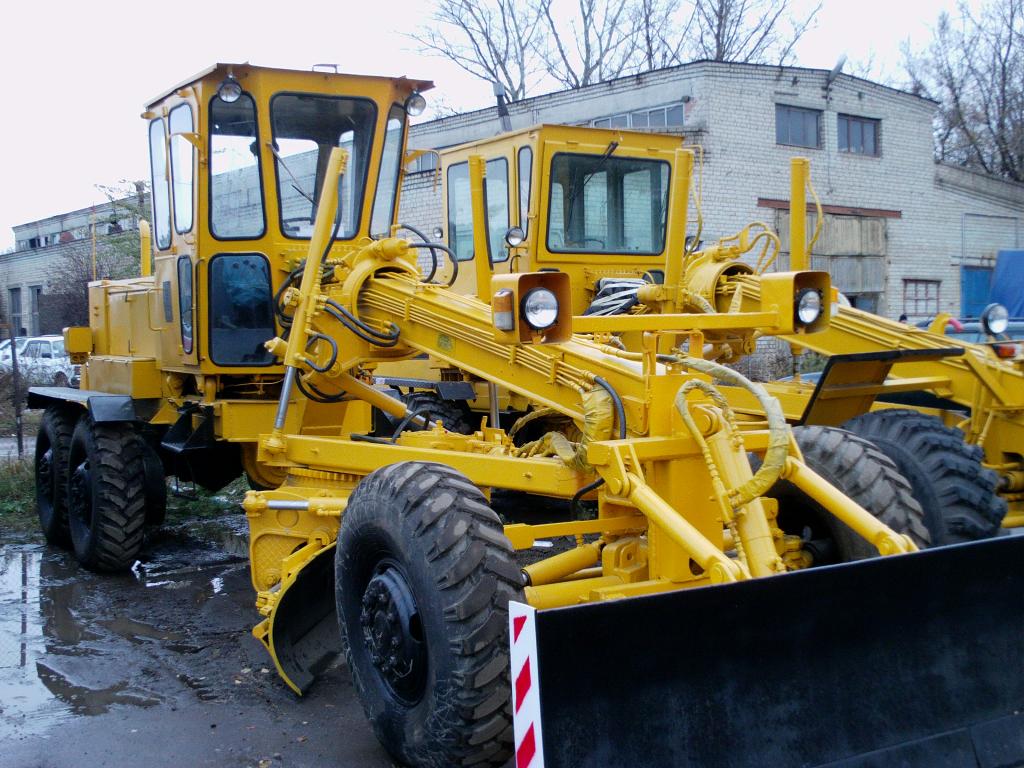 Автогрейдер дз. ДЗ-143 автогрейдер. Трактор грейдер ДЗ 143. Автогрейдер ДЗ-143 новый. ДЗ-143 автогрейдер отвал.