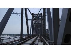 На строящемся мосту через реку Зея началась укладка рельсов На строящемся мосту через реку Зея началась укладка рельсов