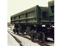 Четырехосный вагон-самосвал